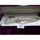 A vintage Lotus simulated pearl four strand choker.