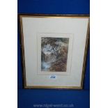 A framed and mounted Watercolour of a waterfall