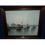 An Oil on canvas of a continental harbour scene with boats;