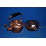 A Copper Bowl and copper kettle.