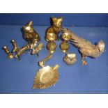 A quantity of brass ornaments including large Pheasant, pair of cats, owl, bud vases, etc.