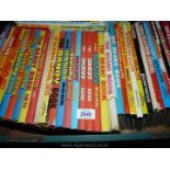 A box of children's annuals including Dandy, Superman, The Victor Book for Boys from the 1970's.