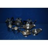 A four piece Doric ware Teaset plus stainless steel sauce boats and teapot.