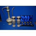 A quantity of brass to include a boxed set of four brass goblets,