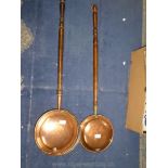 Two Copper warming pans.