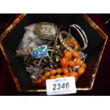 A box of miscellaneous costume jewellery.