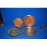A small Birmingham Guild Plate, a larger Plate and two Hodges & Sons. Dublin copper Saucepans.