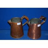 Two large Victorian copper Jugs.