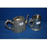 A Pewter Teapot with acorn lid and Pewter Tankard with a fox handle.