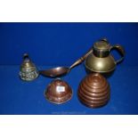 A Copper mould, grain spoon and washing Dolly base, a brass bell and jug.