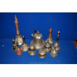 A box of assorted bells to include counter bells, wall hanging bell etc. (eleven in total).