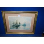 A framed and mounted G. Sutcliffe print depicting fishing boats.