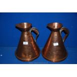 Two large Copper water Jugs, 11" and 12" tall.