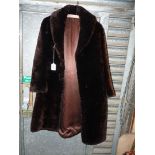 A ladies fur coat (possibly Beaverlamb), size medium/large.