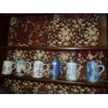 Six large German beer Steins