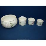 A large Portmeirion ''The Queens Hidden Garden'' fruit Bowl and three planters