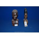 Two carved African hardwood heads.