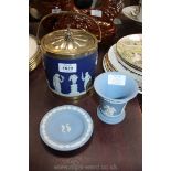 A Wedgwood Jasperware biscuit Barrel in dark blue,