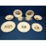 A quantity of Bunnykins china including two handled mug, cereal bowls,