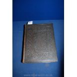 A Holy Bible - Old and new testaments, hard leather cover, in good condition.