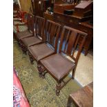 A set of four Oak framed 1940/50's Dining Chairs having turned front legs,