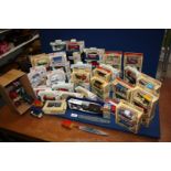 A green box of die cast cars of Yesteryear , boxes of Lledo Days Gone By, Showman's steamer,