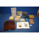 A quantity of miscellanea to include tray of glass negatives, photo album, wooden box,