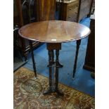 A Mahogany Sutherland Table on turned legs and stretchers,