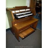 A Viscount Domus DK520 electric Organ having two 56 key manuals and 27 pedal keyboard, 38 stops,