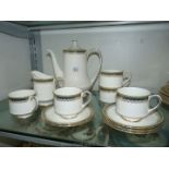 A Royal Albert Coffee set in Kensington pattern to include five cups and saucers, coffee pot,