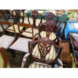 A set of six including two carvers shield back Mahogany Dining Chairs having striped upholstered