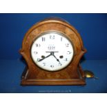 A walnut veneered Hamburg American mantle Clock.