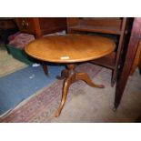 A turned Mahogany topped Occasional Table on turned pillar with three splay feet,