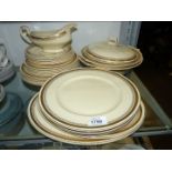 A Myott Staffordshire part dinner service including two meat platters, six large plates,