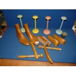 Miscellaneous wooden shoe stretchers and four wooden wig/hat stands.