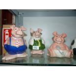 Three Wade Natwest Pigs, one with no stopper.