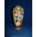 A Japanese Satsuma vase, cream/orange/gold with bird decoration.