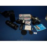 A Praktika MTL Camera, Miranda Flashgun, lens, etc.