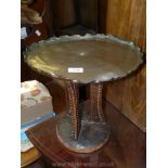 A copper topped pie crust low occasional Table.