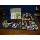 A small suitcase of ephemera including photographs, birth certificate, police dog trials,