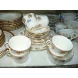 ***A Royal Doulton 'Belmont' part tea and dinner service comprising six cups, thirteen saucers,