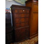 A Mahogany Chest on Chest, the base with three long drawers and a brushing/folding slide,