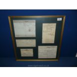 Five 1872 Receipts of a dog licence, trousers, boots, shoes, etc. in a glazed picture frame.