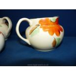 Three vintage Arthur Wood Jugs, cream ground with floral decoration (two a/f).