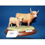 A Border Fine Arts figure of Highland Cow and calf, with certificate, boxed.