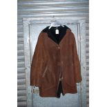 A gents sheepskin Coat, dark brown, size large.