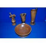 A Treen bowl (24 cm) and three turned Vases with pestles, the largest being 7'' high.