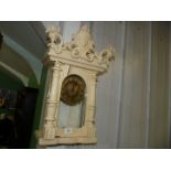 A Victorian wall Clock in cream painted case,