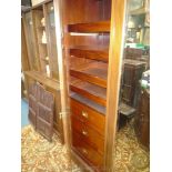 A good quality Edwardian cross-banded and light/dark wood strung Mahogany triple Wardrobe having to