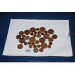 A quantity of pre-decimal British Coins including pennies, farthings, shilling,